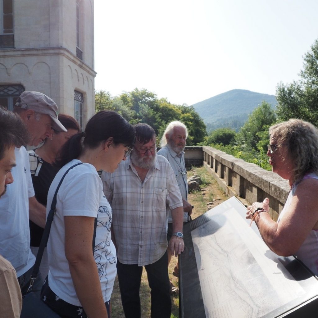 In front of the map of the former mulberry plantation at Maison Rouge.